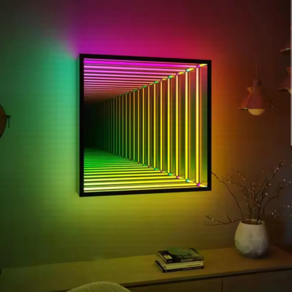 Infinity mirror glowing in rainbow colors on a wall