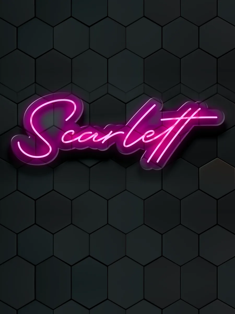 Pink Scarlett neon name sign glowing on a dark hexagon wall