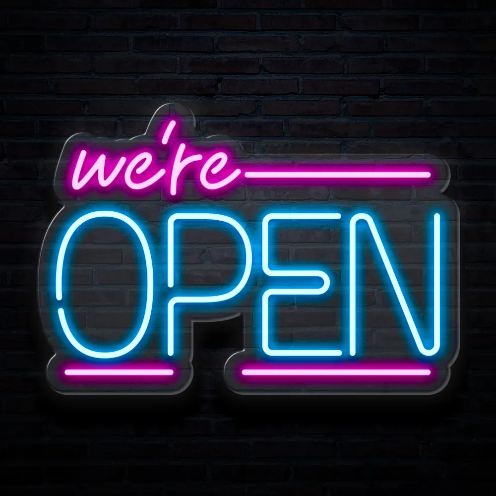 We’re OPEN neon sign in pink and blue